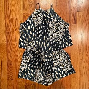 NWT Tyche teal romper with black/white/yellow peacock pattern